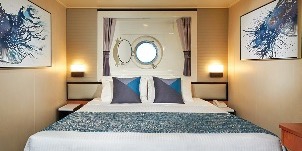 Croisière NCL Norwegian Cruise Line Jade Vue mer au milieu du navire avec hublot