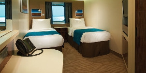 ncl norwegian cruise line breakaway vue mer au milieu du navire avec fenêtre panoramique chambre à coucher